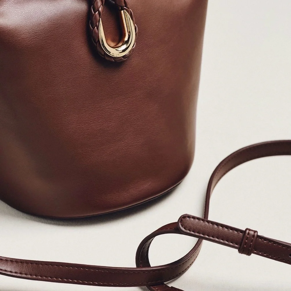 New Anthropologie aota twist tie top handle bucket bag crossbody brown gold